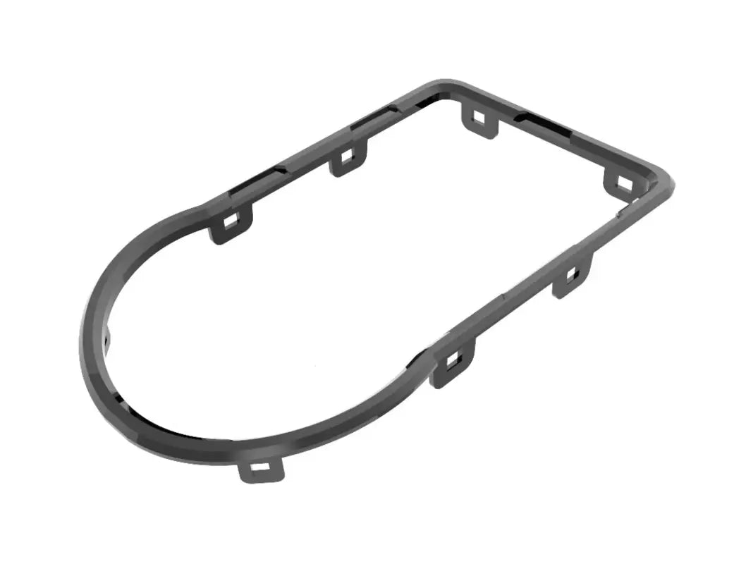 White oval trim piece from the chrome delete kit for Toyota Tacoma 2016-2023, designed for dashboard customization.