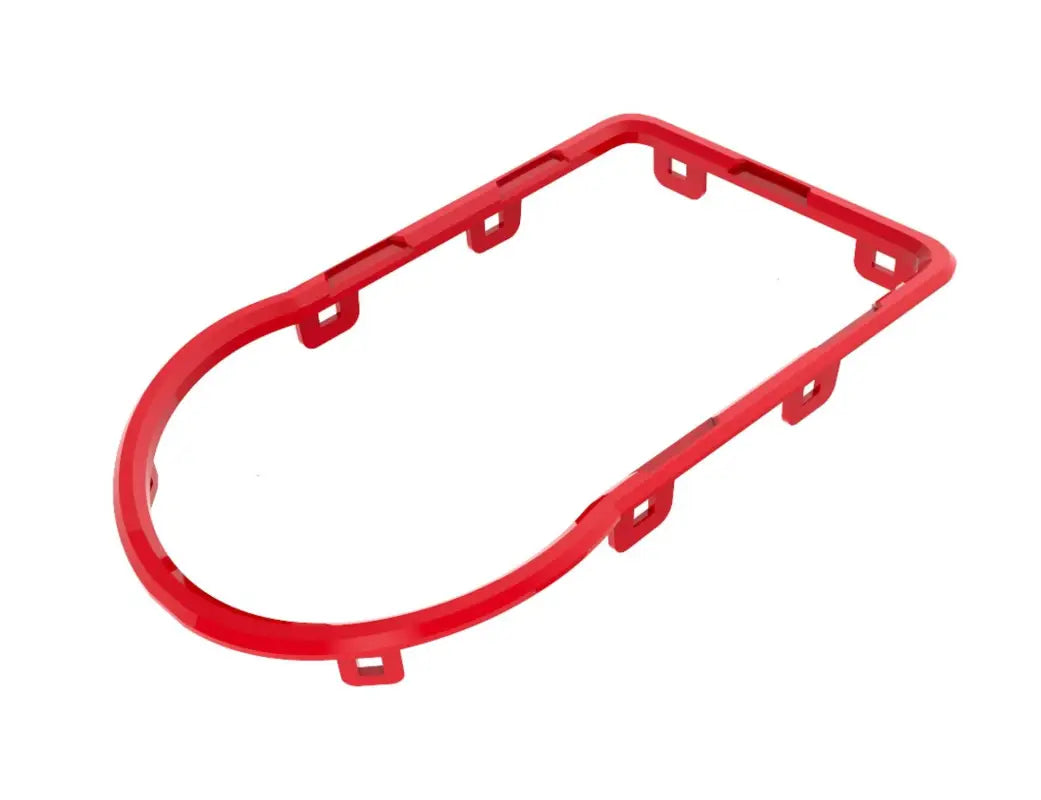 Blue oval trim piece from the chrome delete kit for Toyota Tacoma 2016-2023, offering a custom-fit design.