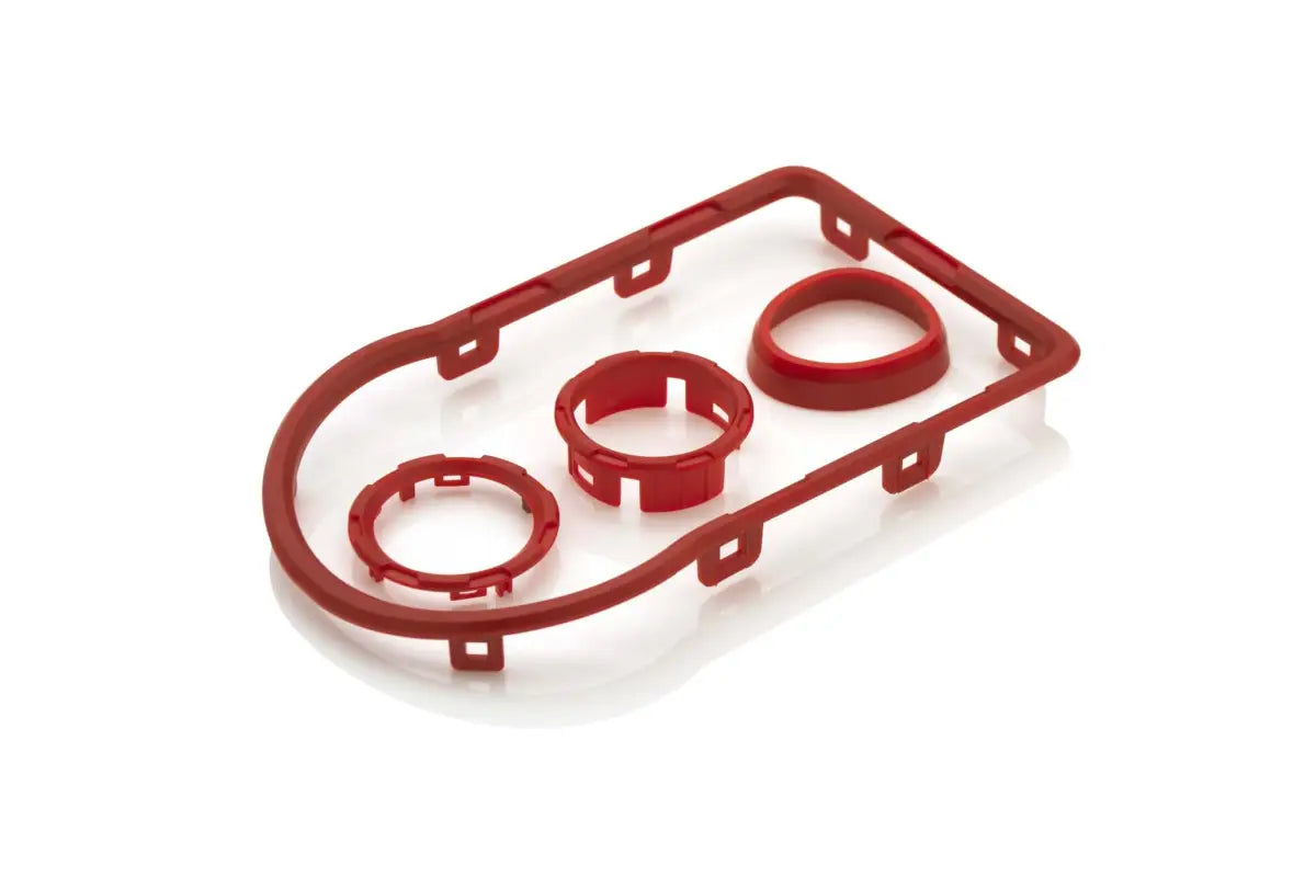 Red chrome delete kit for Toyota Tacoma 2016-2023, featuring precision-fit trim pieces for dashboard customization.