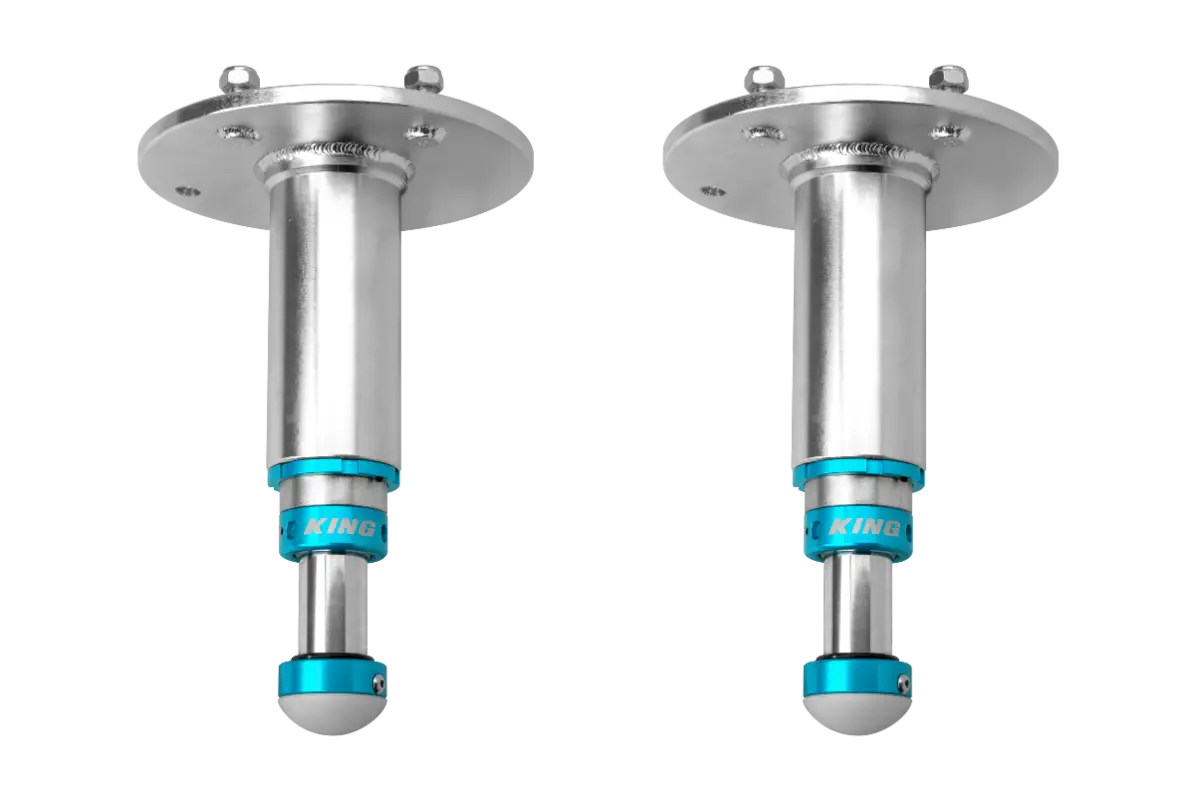 Ram 1500 TRX King 2.0 bump stop kit featuring durable aluminum construction with blue accents, designed for superior ride control.