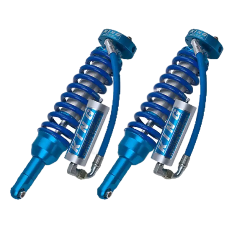 Pair of King Shocks 2.5 front coilovers for Toyota Tacoma (2005-2023) featuring durable blue finish and enhanced suspension performance.