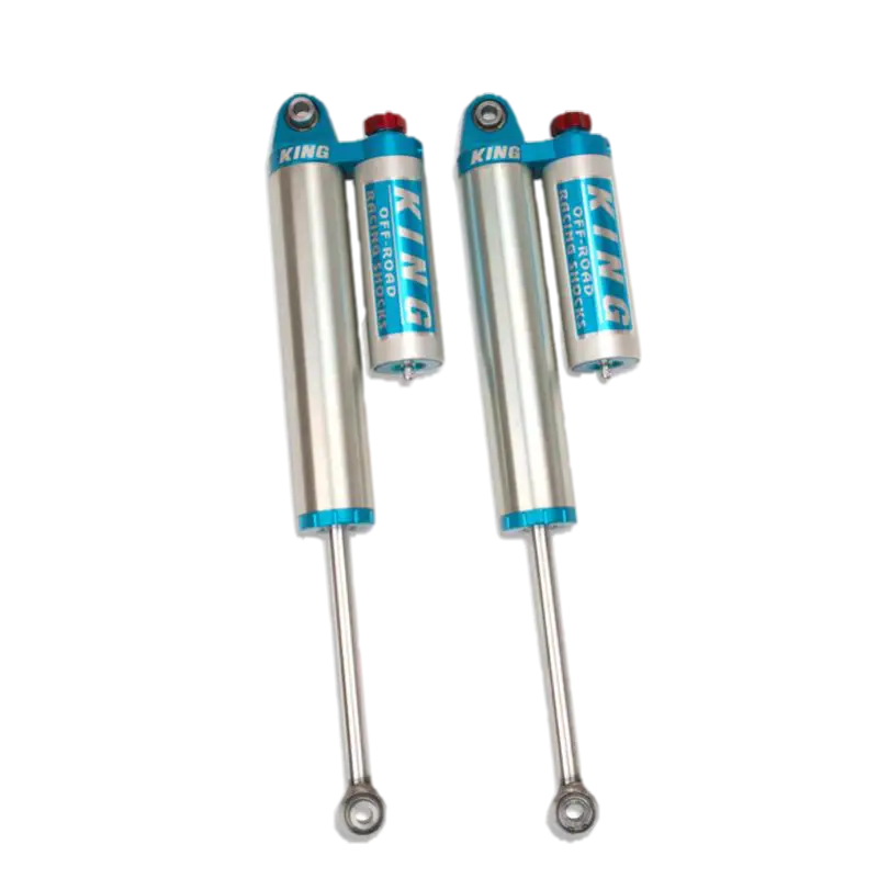 Chevy/GMC 2500/3500 King 2.5 OEM rear shocks with compression adjuster, piggyback reservoir, and robust design for enhanced suspension performance.
