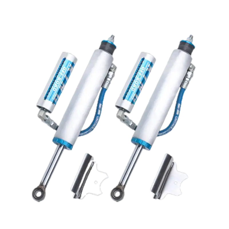 King 2.5 Performance Series front shocks for Chevy/GM 2500/3500HD, featuring remote reservoirs and compression adjusters for 0-2.5” lift.