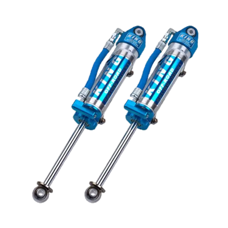 King Performance rear shocks for 1997-2006 Jeep TJ, featuring piggyback hose reservoirs, heat-treated alloy pistons, and chromed shafts.