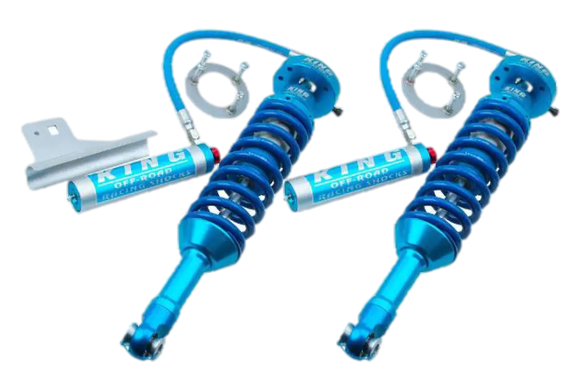 15-20 Ford F150 King 2.5 RR Coilovers with blue anodized finish, remote reservoirs, and mounting hardware for enhanced suspension performance.