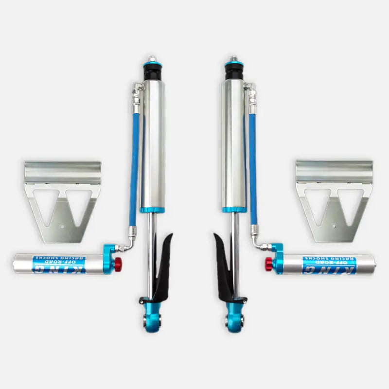 Rear shocks with reservoirs and mounting brackets for 2008-2021 Toyota Land Cruiser. Designed for improved suspension performance and adjustability.