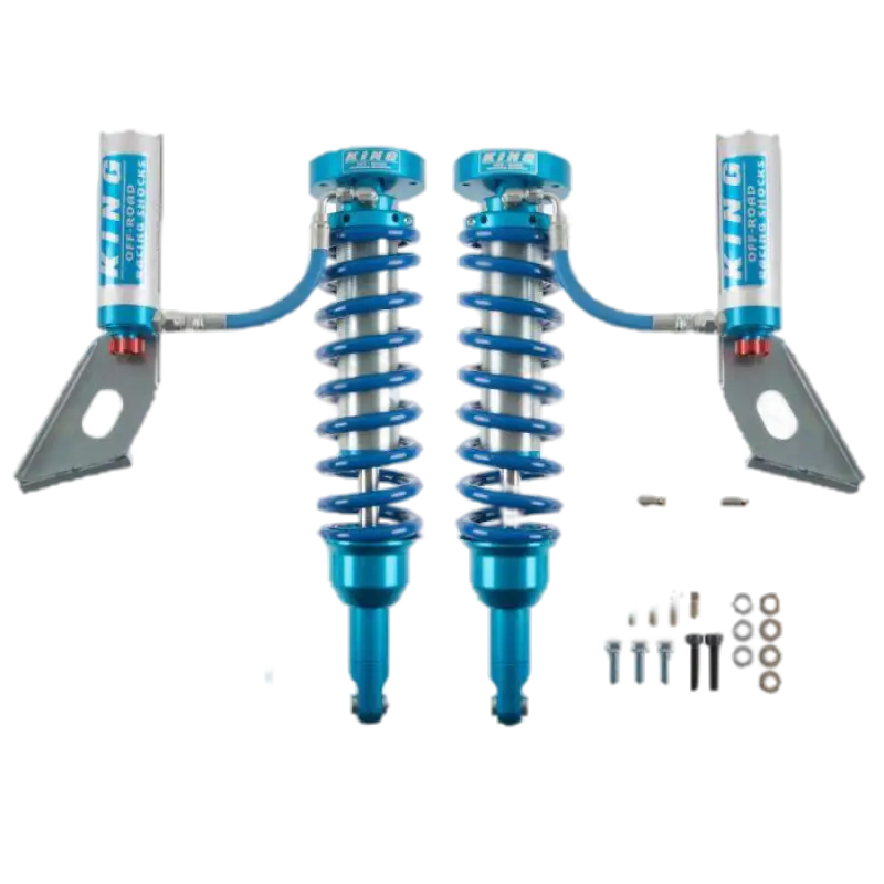 King 2.5 RR EXT Travel Coilovers with adjusters for Toyota 4Runner, featuring durable blue anodized components and mounting hardware.