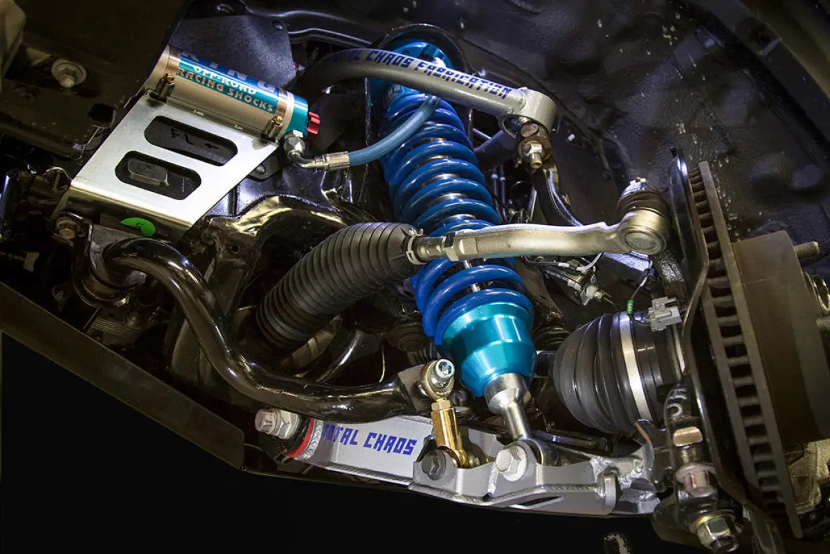 Installed King 2.5 RR coilovers and upper control arms on a 07-21 Toyota Tundra, showcasing upgraded suspension components for off-road performance.