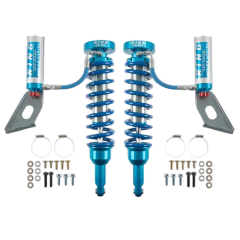 Pair of 4Runner King Shocks 2.5 RR Coilovers with mounting hardware, designed for improved wheel travel and suspension for Toyota 4Runner.