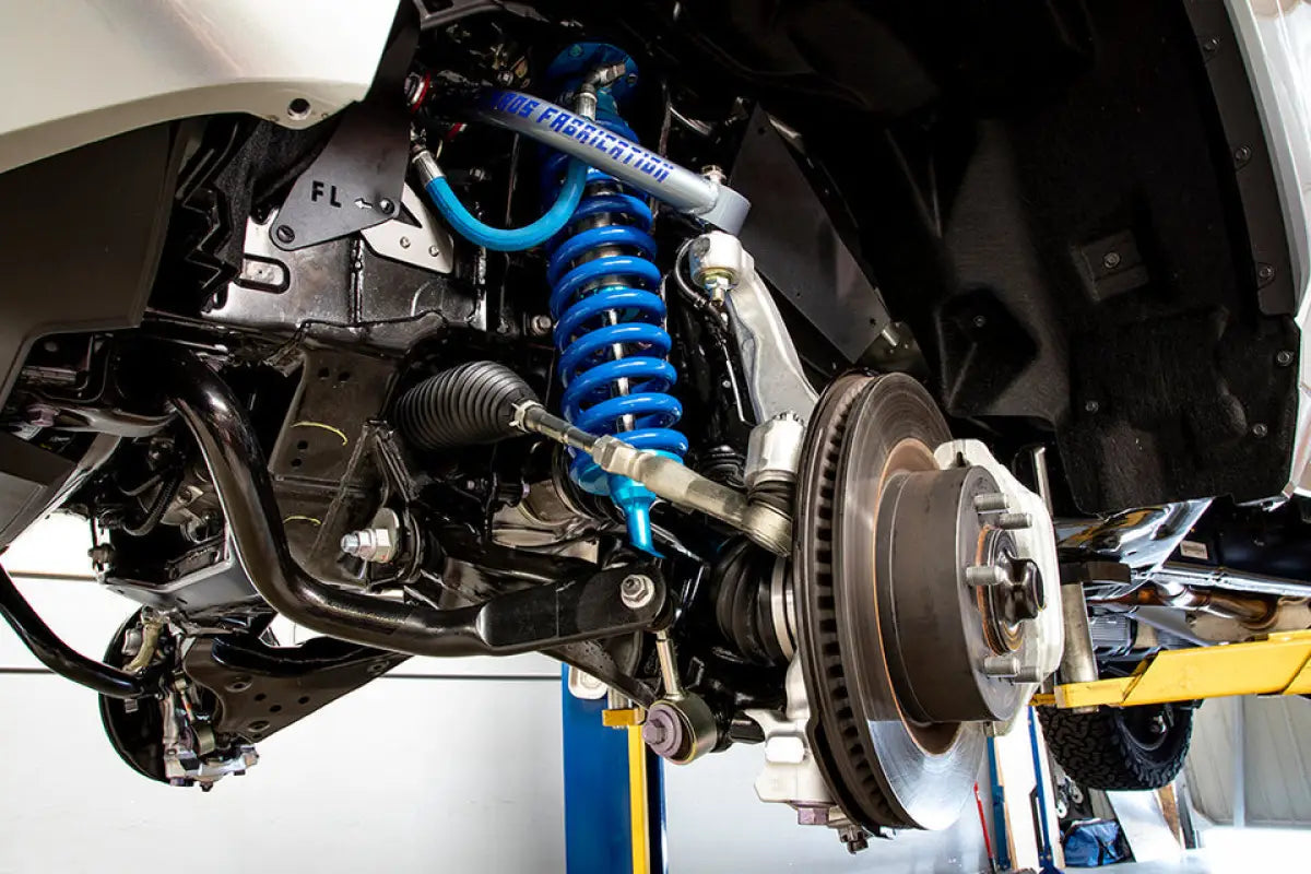 Installed King 2.5 RR coilovers on a 22-23 Toyota Tundra, highlighting suspension upgrade with improved travel and factory-tuned performance.