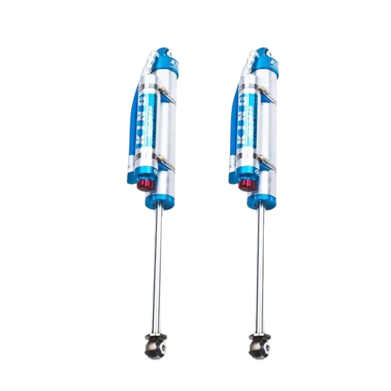 King 2.5 PB rear shocks with adjusters for Chevy/GMC 2500/3500, offering improved suspension performance and real-world tested reliability.