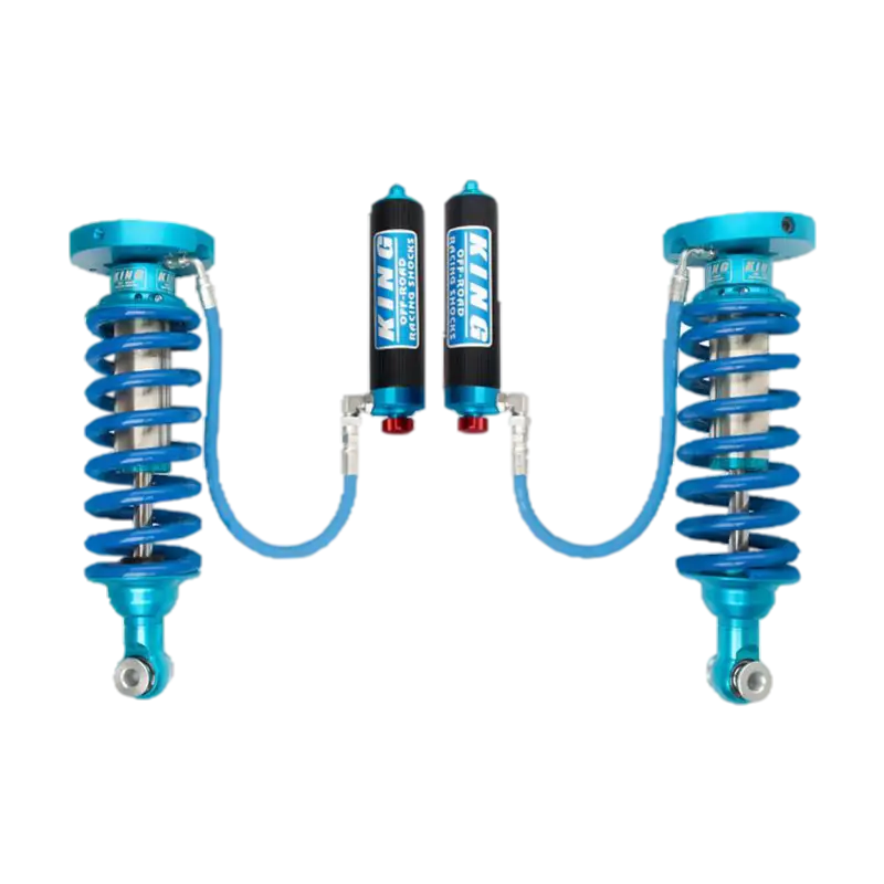 18-23 Ford Expedition Coilover Kit - King 2.5 with blue springs and remote reservoirs for adjustable ride height and improved damping.