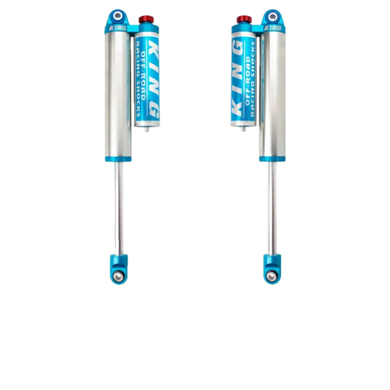 Nissan Titan XD rear shocks by King Shocks, featuring 2.5-inch diameter and 20-click damping adjusters for 2016-2023 models.