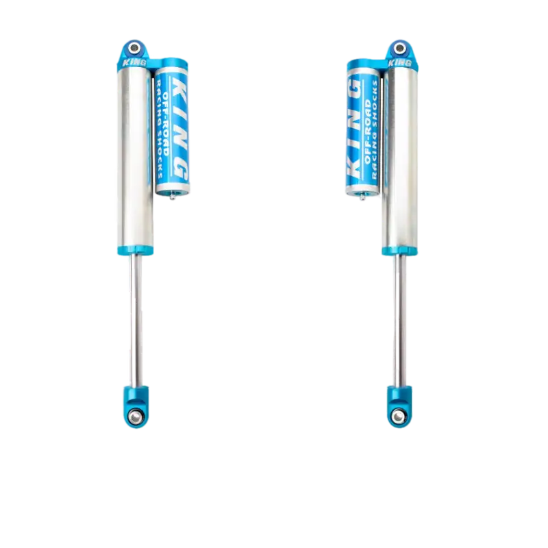 King 2.5 rear shocks for 2016-2023 Nissan Titan XD with blue anodized finish and external reservoirs, designed for bolt-on installation.