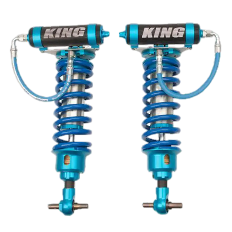07-18 Chevy/GM 1500 Coilover Kit - Performance Race with adjustable blue coilovers and remote reservoirs for enhanced suspension.