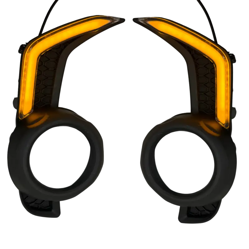 4Runner LED DRL Fang Light Bezel Kit with amber illumination, featuring a sleek black honeycomb design for 2014-2024 Toyota models.
