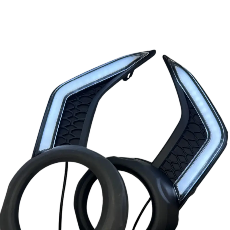 4Runner LED DRL Fang Light Bezel Kit with white illumination, showcasing a modern black honeycomb pattern for Toyota 4Runner vehicles.
