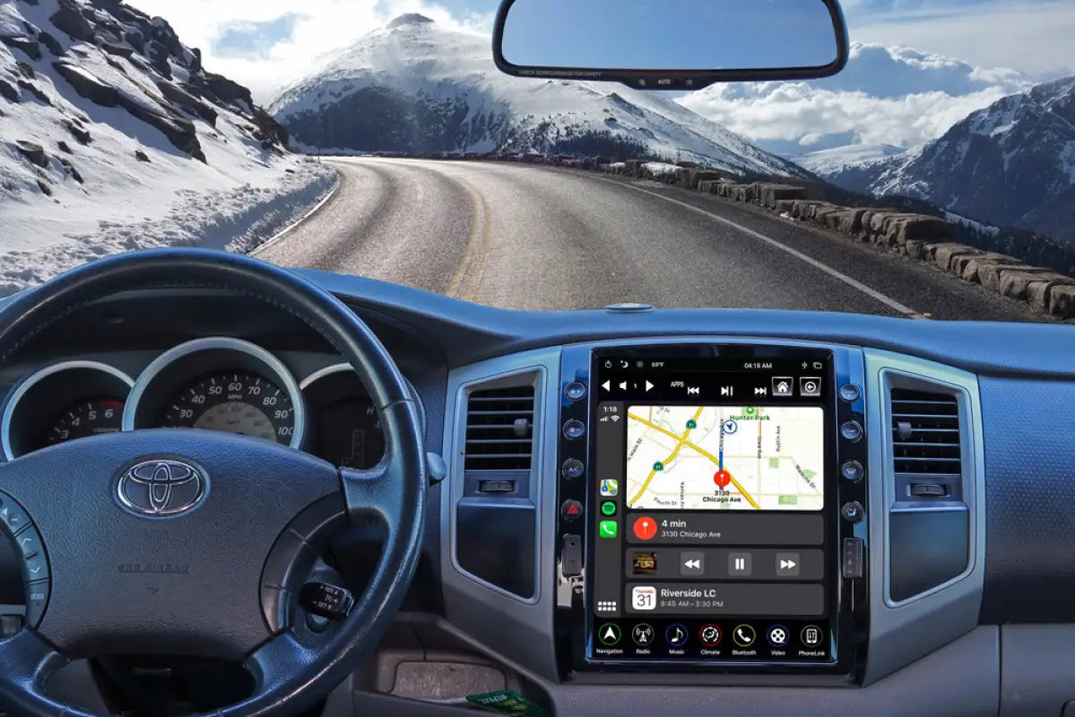 LinksWell GEN 5 12.1-inch head unit in a Toyota Tacoma dashboard, displaying GPS navigation with a scenic mountain road view.