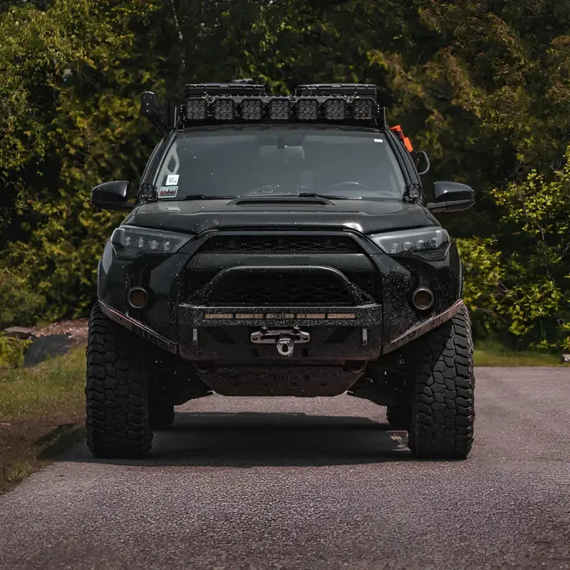 Front view of 5th Gen Toyota 4Runner equipped with Lo Pro Bumper High Clearance Additions, designed for off-road durability.