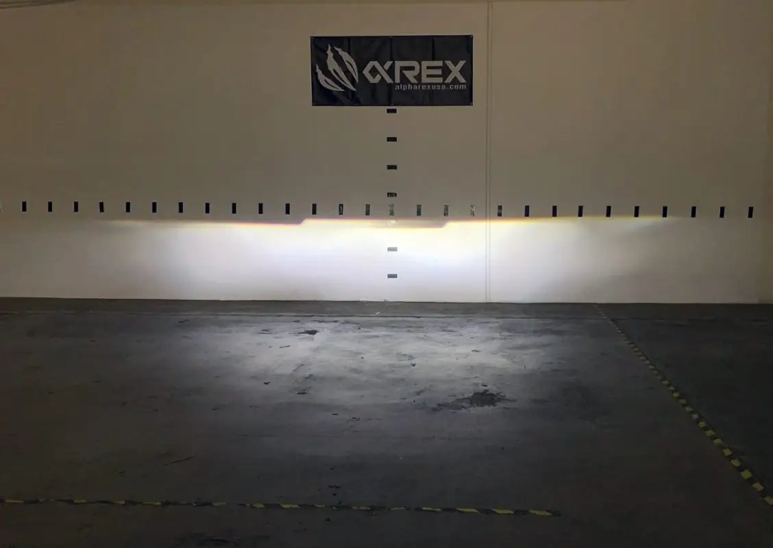 Beam pattern output of Ford Ranger 19-22 LUXX-Series LED projector headlights displayed against a wall in a controlled test.