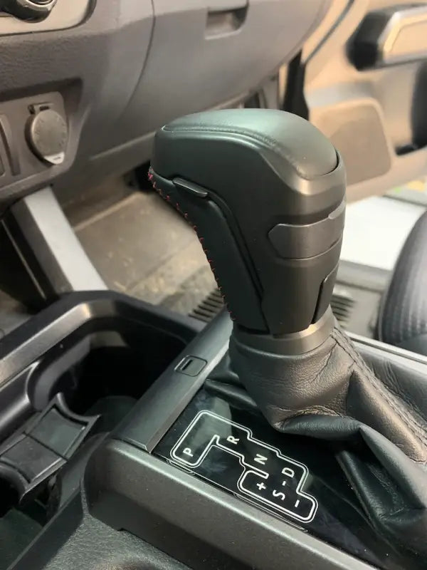 Meso Stealth Shift Knob installed in a 16-23 Tacoma interior, blending seamlessly with the vehicle's design.