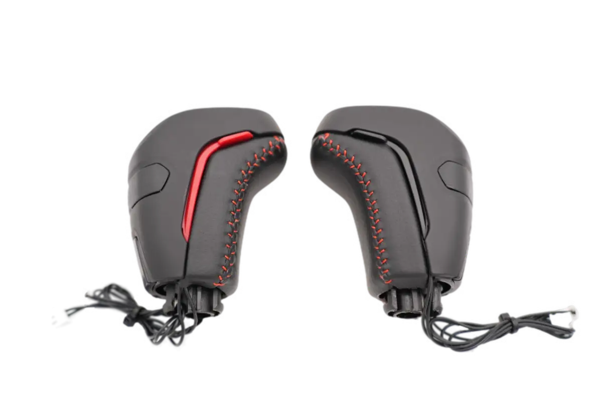 Meso Stealth Shift Knob in black with red and black button options, showcasing premium stitching for 16-23 Tacoma.