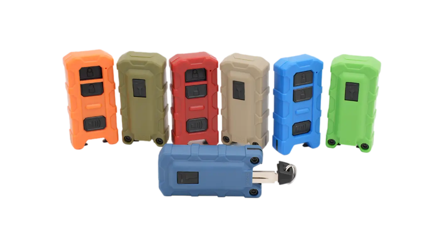 Minimalist Key Fob V2 in seven colors, featuring a rugged design with spare key slot and bottle opener, compatible with Toyota Tacoma, Tundra, and 4Runner.