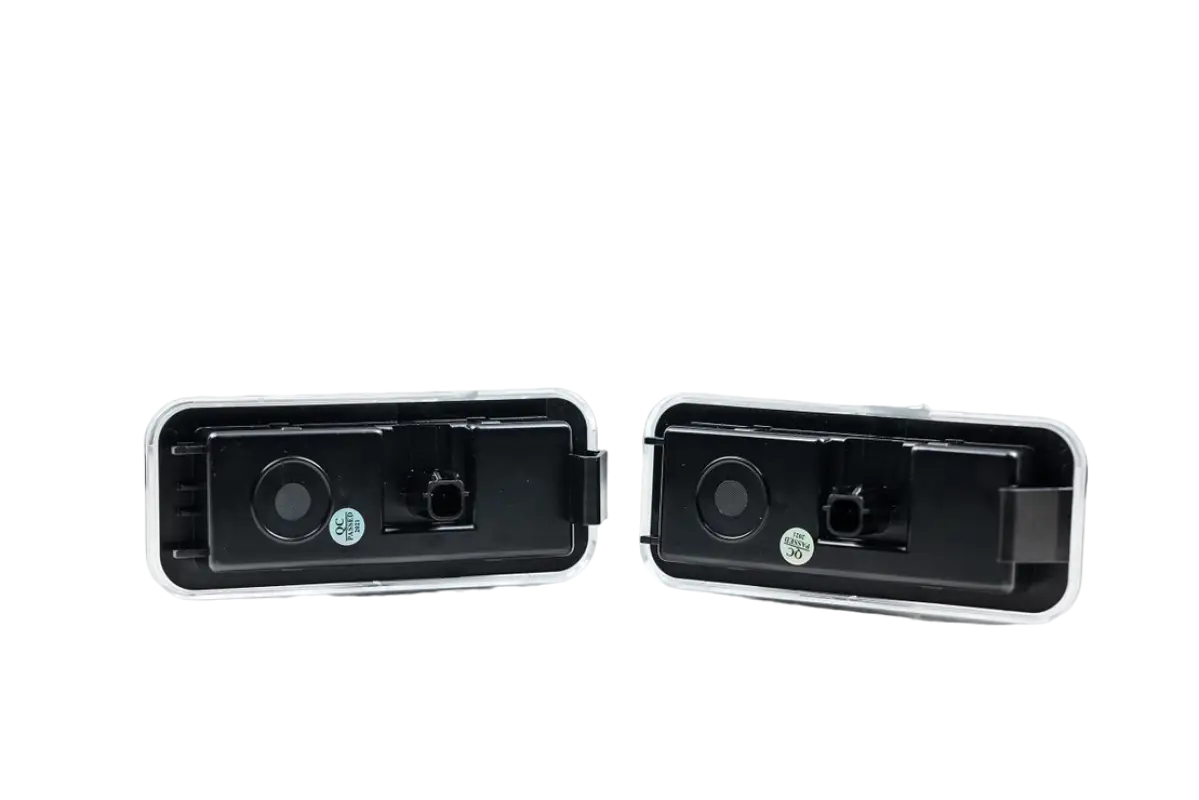Rear view of Morimoto XB LED bed light replacements for Tacoma (2020-2023), highlighting the black housing and OEM fitment connectors.