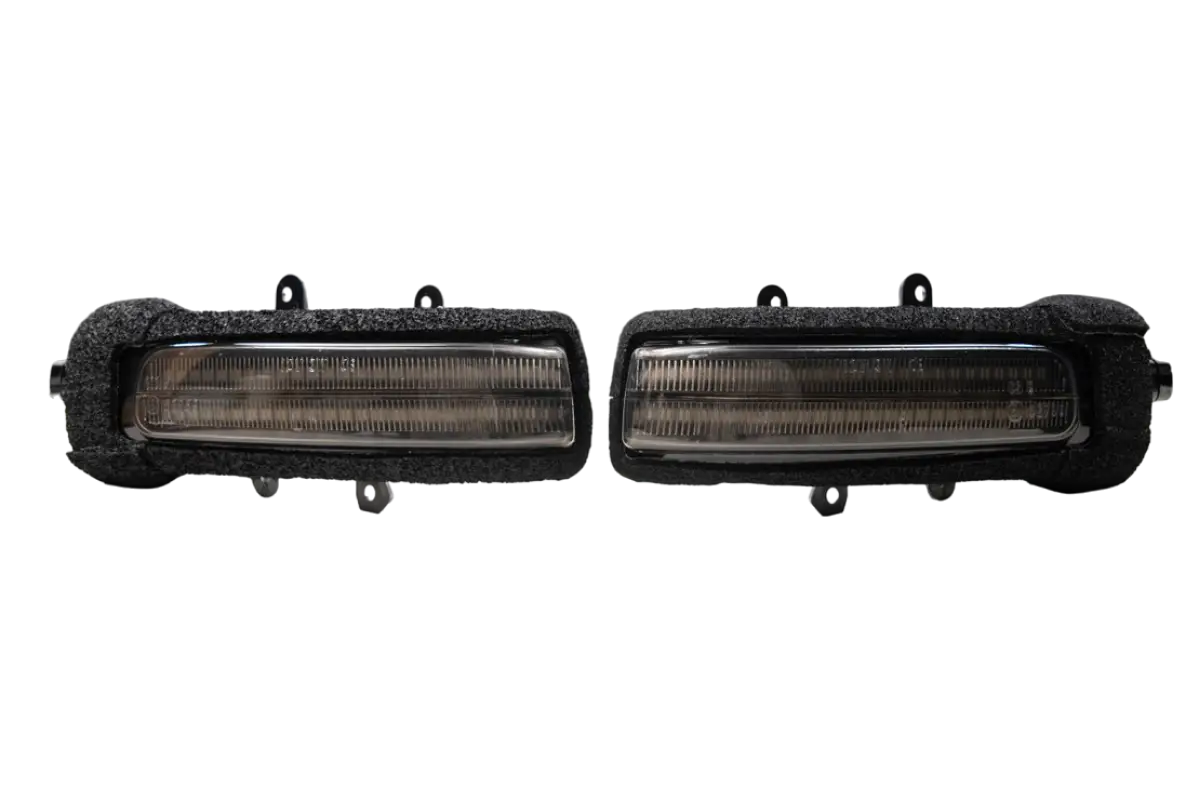 Morimoto XB turn signals for Tacoma (2012-2015) and 4Runner (2010-2013) with a sleek smoked lens design, shown as a pair.