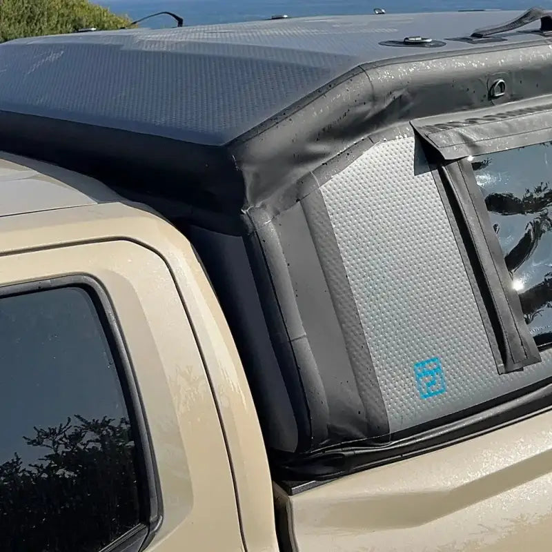 Close-up of the MR Full-Size 5.5' Bed air-topper shell installed on a truck, showcasing its durable material and precise fit.