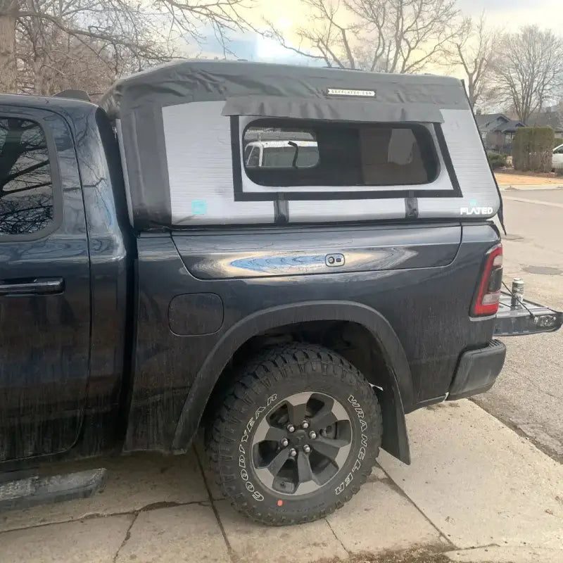 Side view of a truck with MR Full-Size 5.5' Bed air-topper shell installed, highlighting its compact and secure fit.