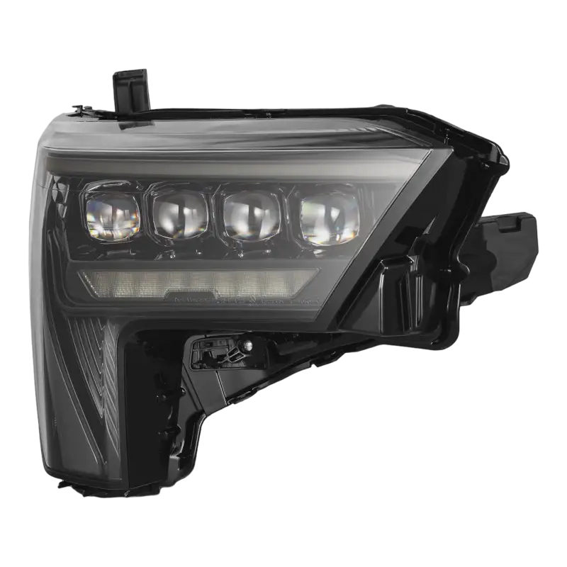 Close-up of a single AlphaRex NOVA-Series LED projector headlight in Alpha-Black, designed for 22-24 Toyota Tundra and Sequoia models.