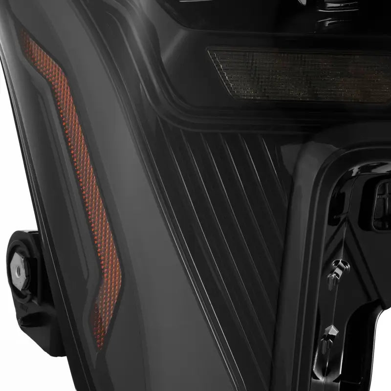 Close-up of the orange accent light on AlphaRex NOVA-Series LED projector headlight, adding a stylish touch to the design.