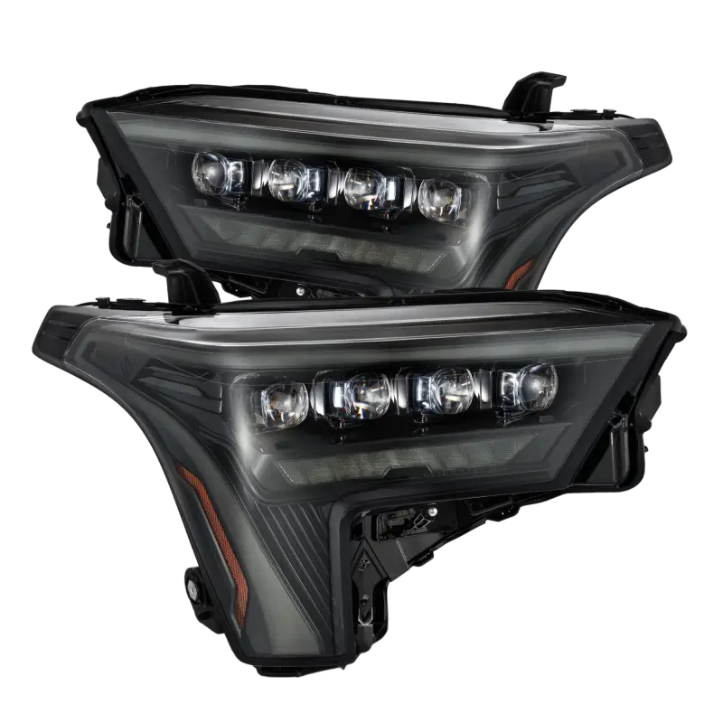 Pair of AlphaRex NOVA-Series LED projector headlights in Alpha-Black for 22-24 Toyota Tundra and Sequoia, showcasing sleek design and advanced lighting.