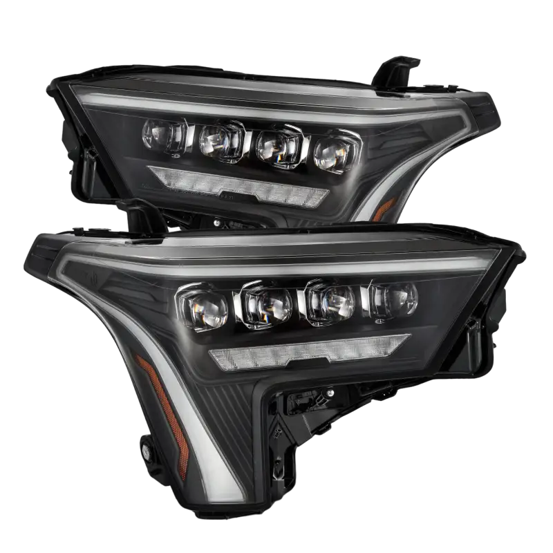 Pair of AlphaRex NOVA-Series LED projector headlights in black for 22-24 Toyota Tundra and Sequoia, featuring sleek design and advanced lighting.