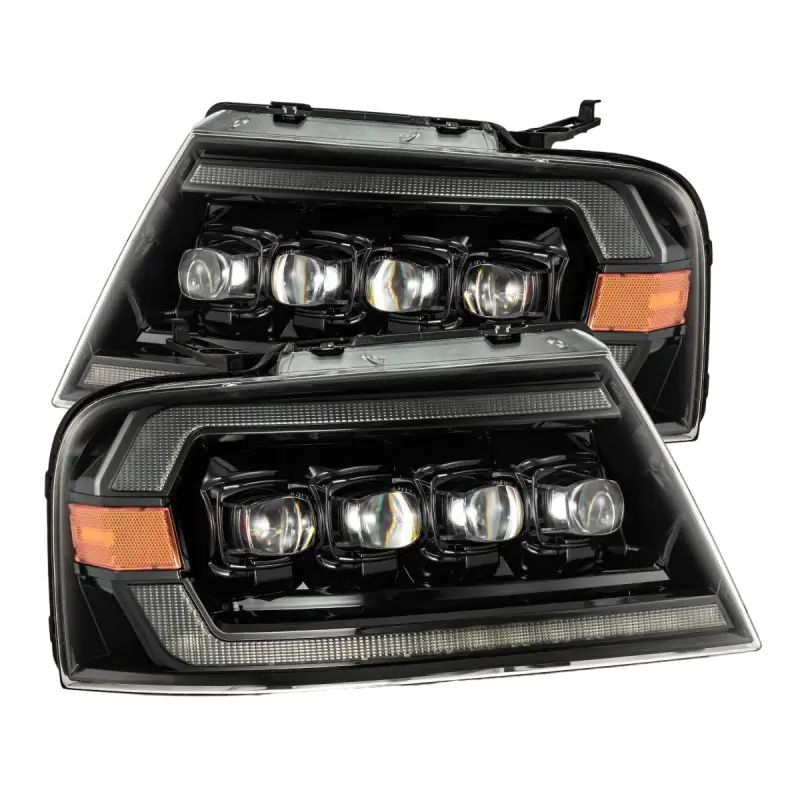 Ford F150 04-08 LED projector headlights in black housing with quad projector lenses and amber side markers.