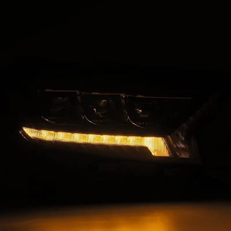 Ford Ranger 19-22 LED projector headlights displaying amber sequential turn signal light in a dark environment for enhanced safety.