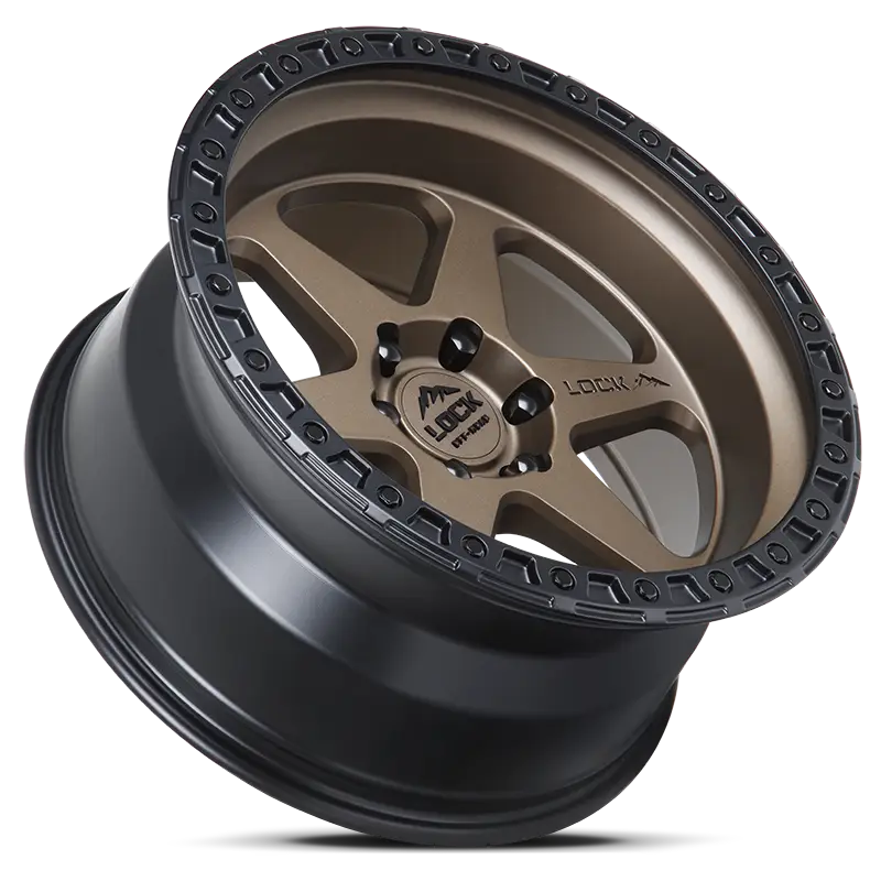 Angled view of OLYMPUS Matte Desert Bronze wheel highlighting its tri-beam strength, matte bronze finish, and black beadlock-style rim.