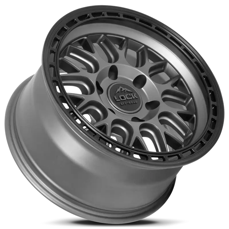 Angled view of ONYX Wheels in Matte Grey highlighting its rugged construction and modern mesh design for off-road vehicles.
