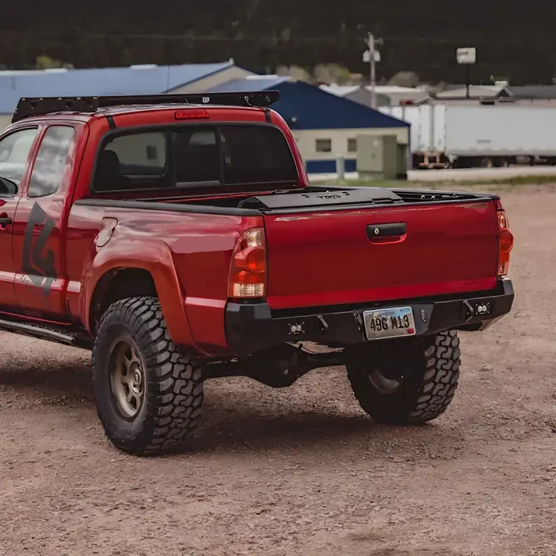 Full rear view of a 2nd Gen Tacoma with Overland bumper, highlighting off-road capability, standard cutouts, and secure fit.