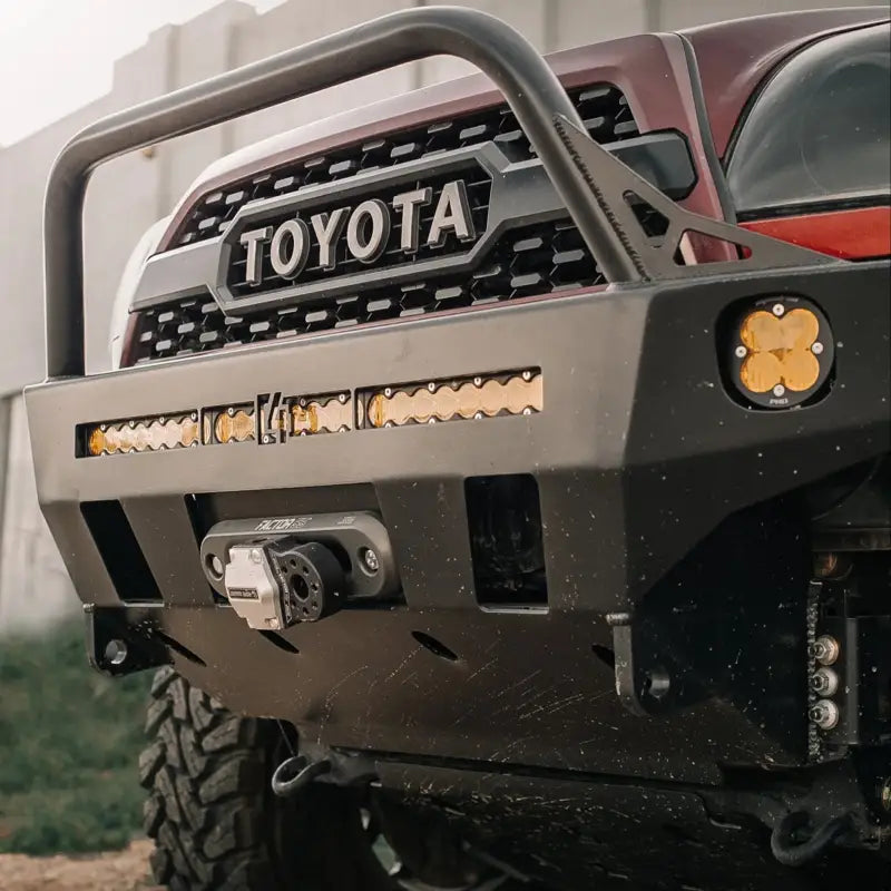 Close-up of 4Runner Overland Series Front Bumper with integrated LED lights and winch mount, designed for 2003-2009 models.