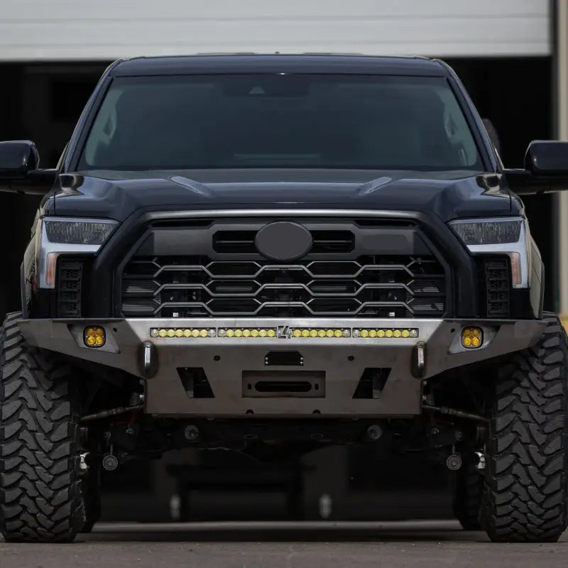 Tundra Overland Front Bumper for 3rd Gen 2022+ with winch and light bar compatibility, shown on a black Tundra with rugged tires.