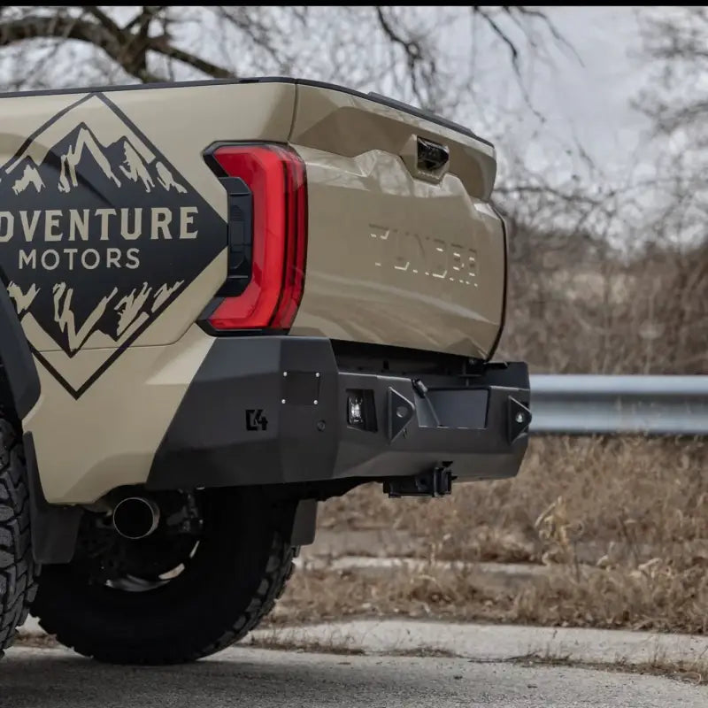 Tundra Overland Rear Bumper for 2022+ models in black steel with reverse lights and sensor compatibility, shown on beige truck.