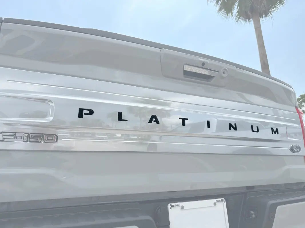 Truck tailgate with Platinum lettering showcasing durable tailgate letter inserts for Ford F-150