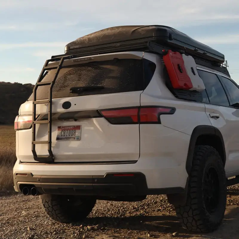 Toyota Sequoia Prinsu Ladder with modular design mounted on a white 2022-current Sequoia. Lightweight, powder-coated black, and easy to install.