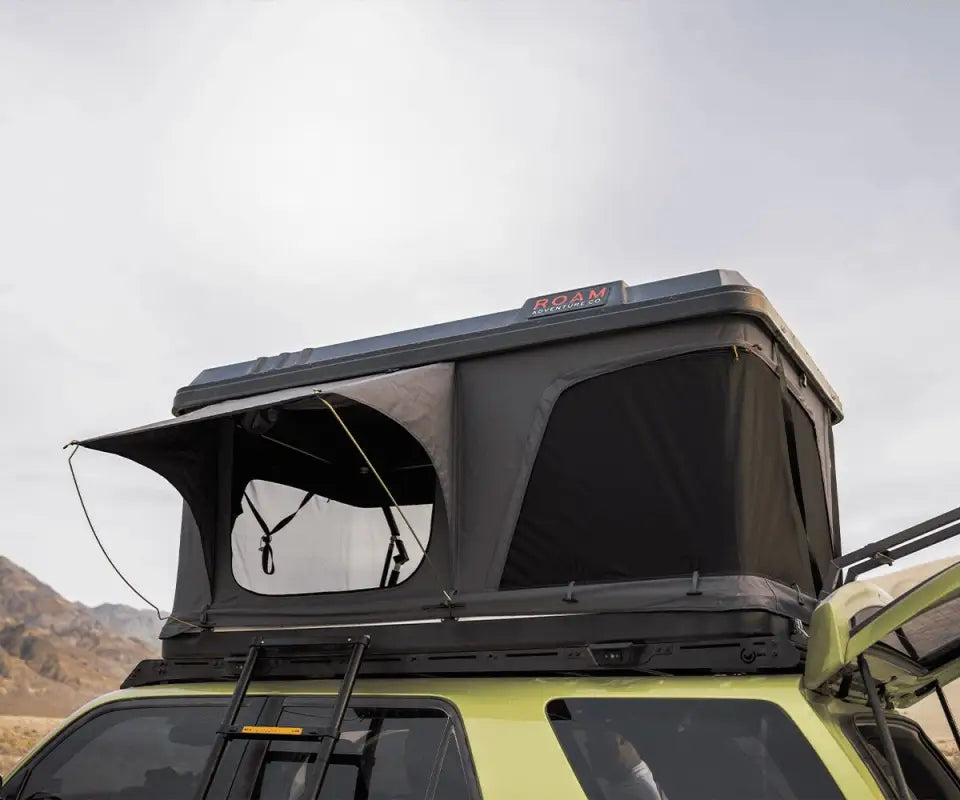 Close-up of a rooftop tent mounted on a Toyota 4Runner Prinsu Roof Rack, emphasizing durability and outdoor functionality.