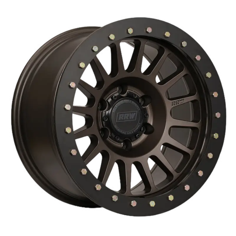 Hybrid wheel with a mounted black protection ring and gold bolts, showcasing a durable and stylish design.