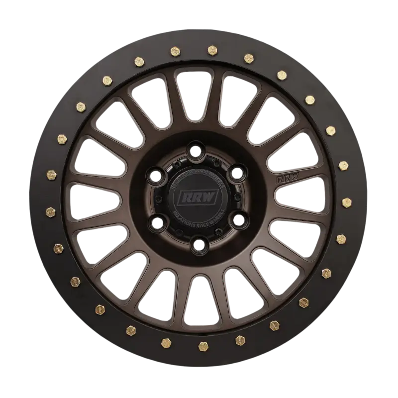 Front view of a hybrid wheel with a black protection ring and gold bolts, emphasizing its precision and durability.