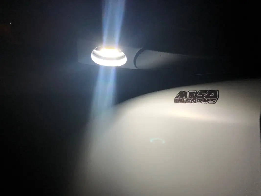 4 Runner Puddle Pods emitting bright white light at night, enhancing visibility around the vehicle's exterior.