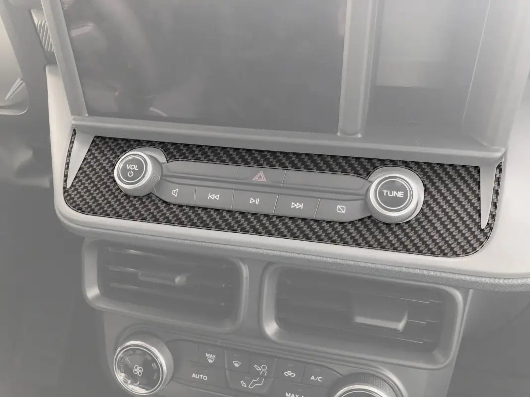 Carbon fiber car dashboard trim for radio control accent overlay on Ford Maverick 2022-2024